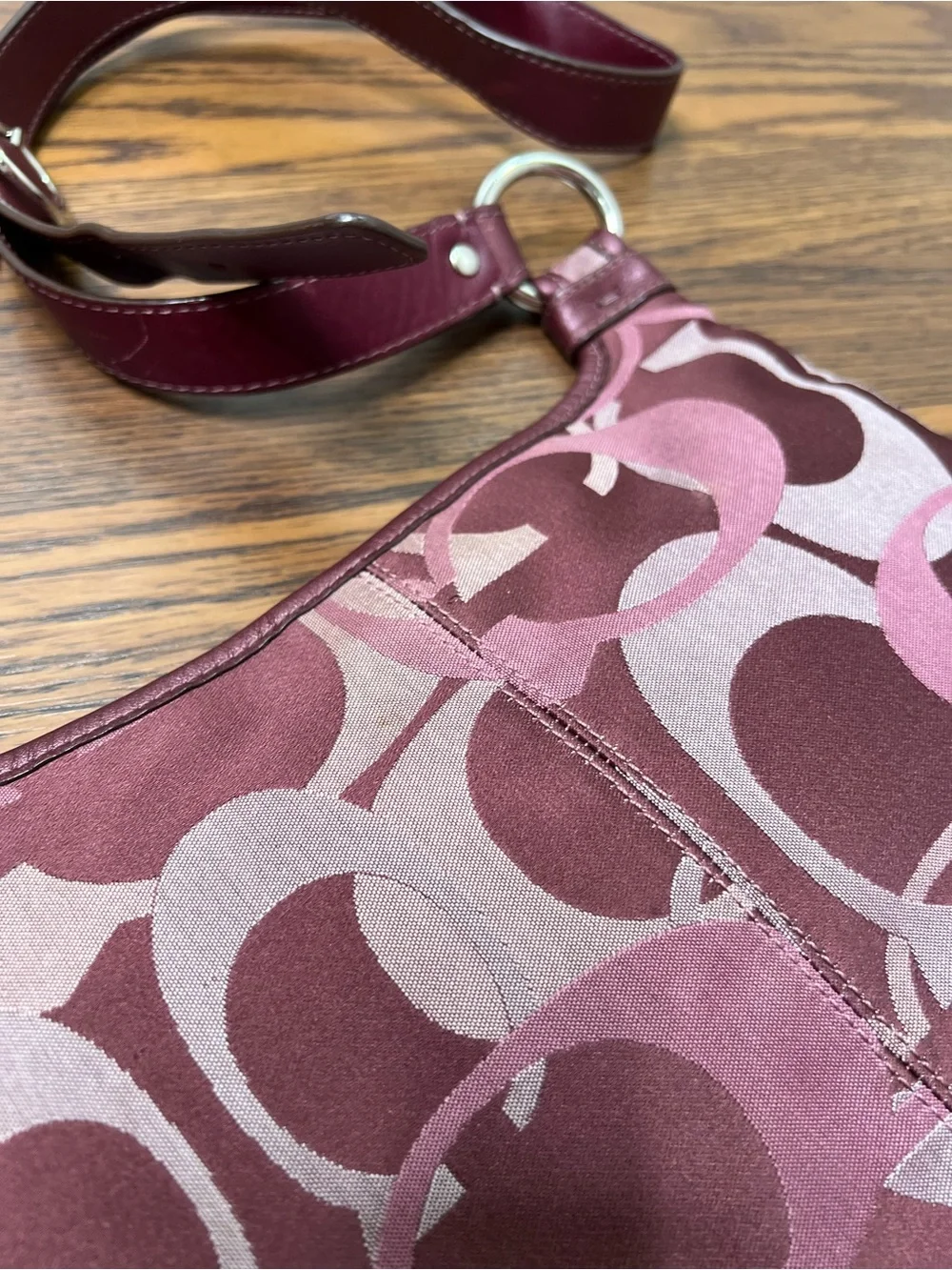Coach Penelope Optic Signature Hippie Crossbody Bag in a purple/plum color